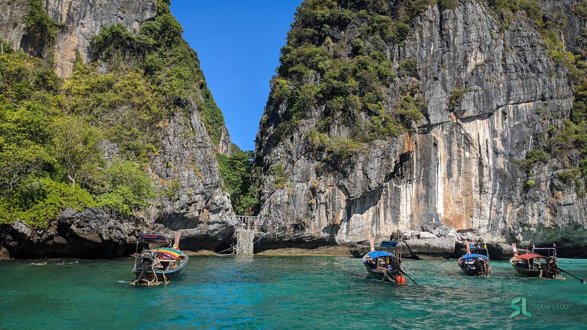 A group of tourists enjoy swimming on the Phi Phi Islands