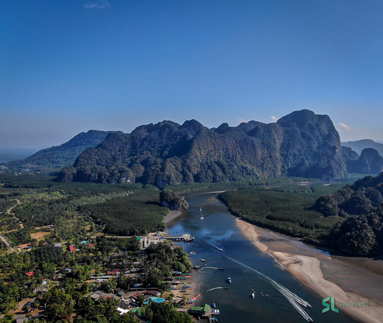 Tourist drone taking photos from a kayaking spot in Krabi