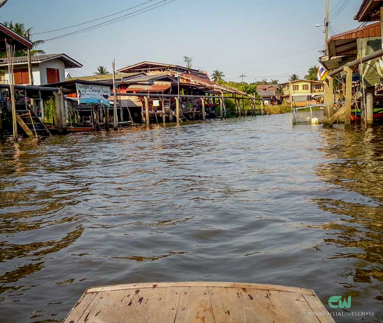 Tourist boat is cruising through a local canal