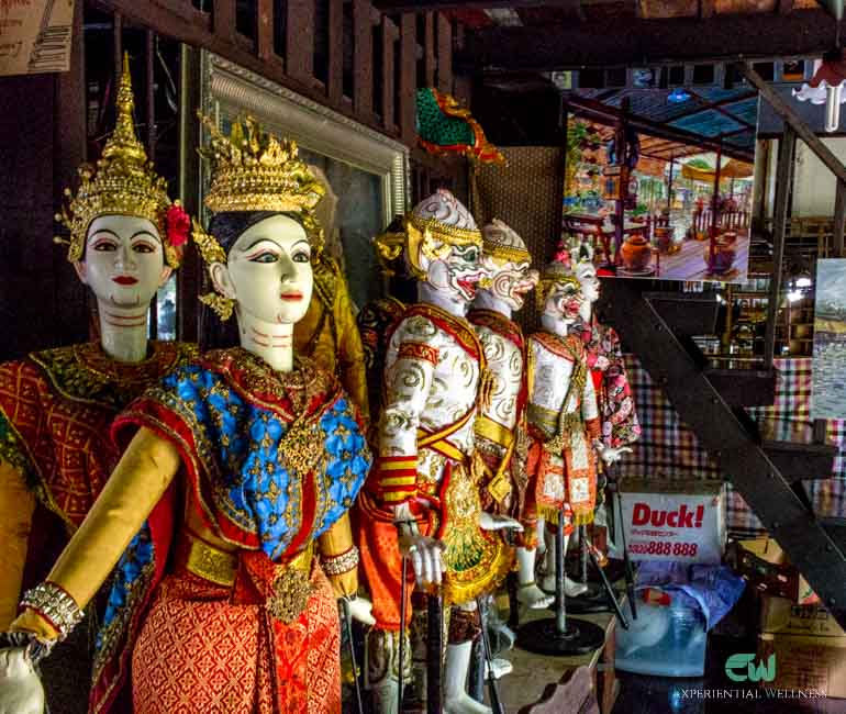 A scary look of a Thai puppet doll, including a man, a woman, and monkeys from the story of Ramayana from Hindu Mythology