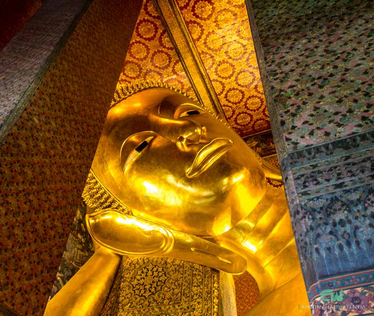 A glimpse of the third largest but most beautiful Reclining Buddha image during a tour in Wat Pho
