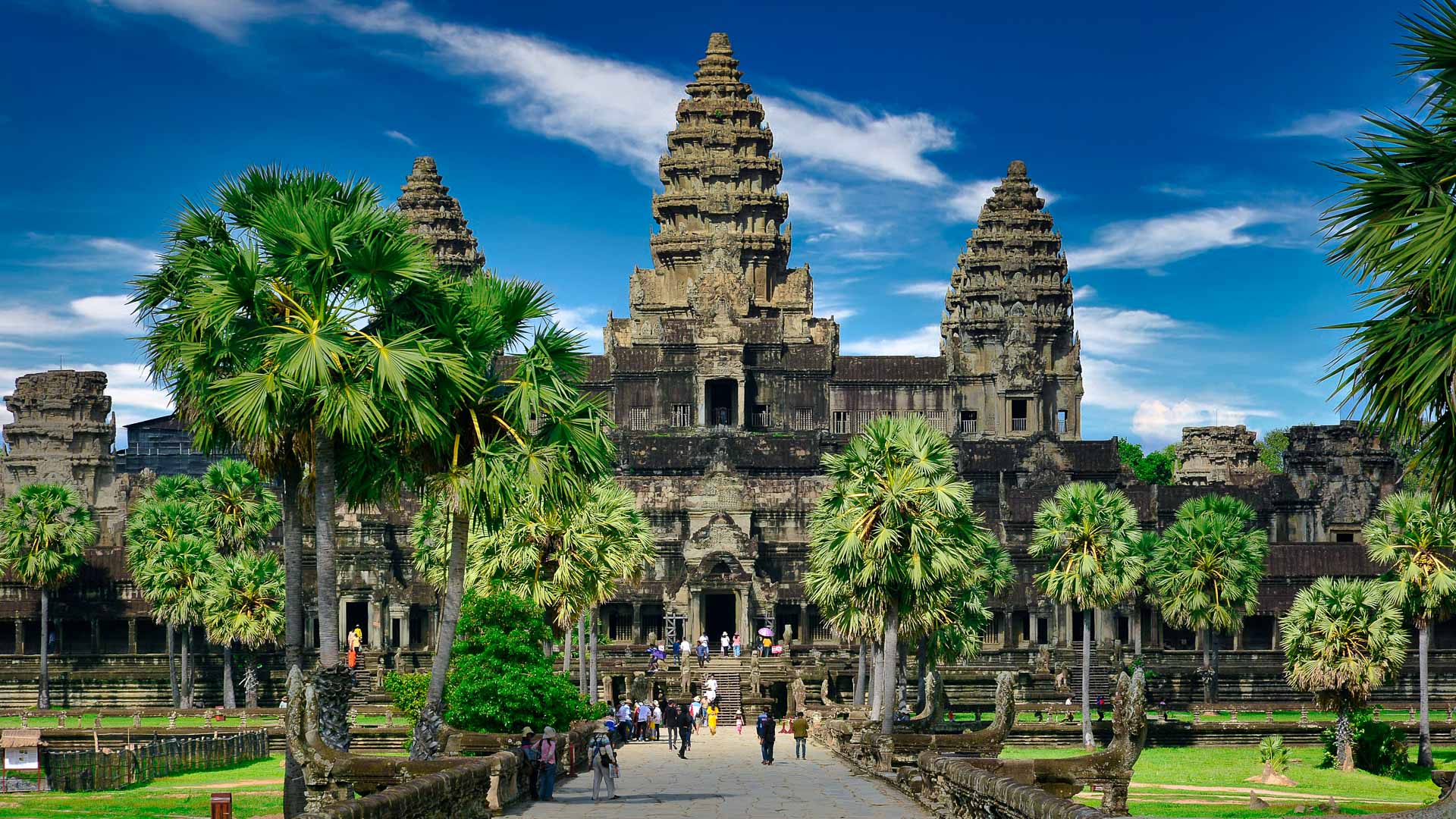A group tour is entering Angkor Wat in Siem Reap, Cambodia
