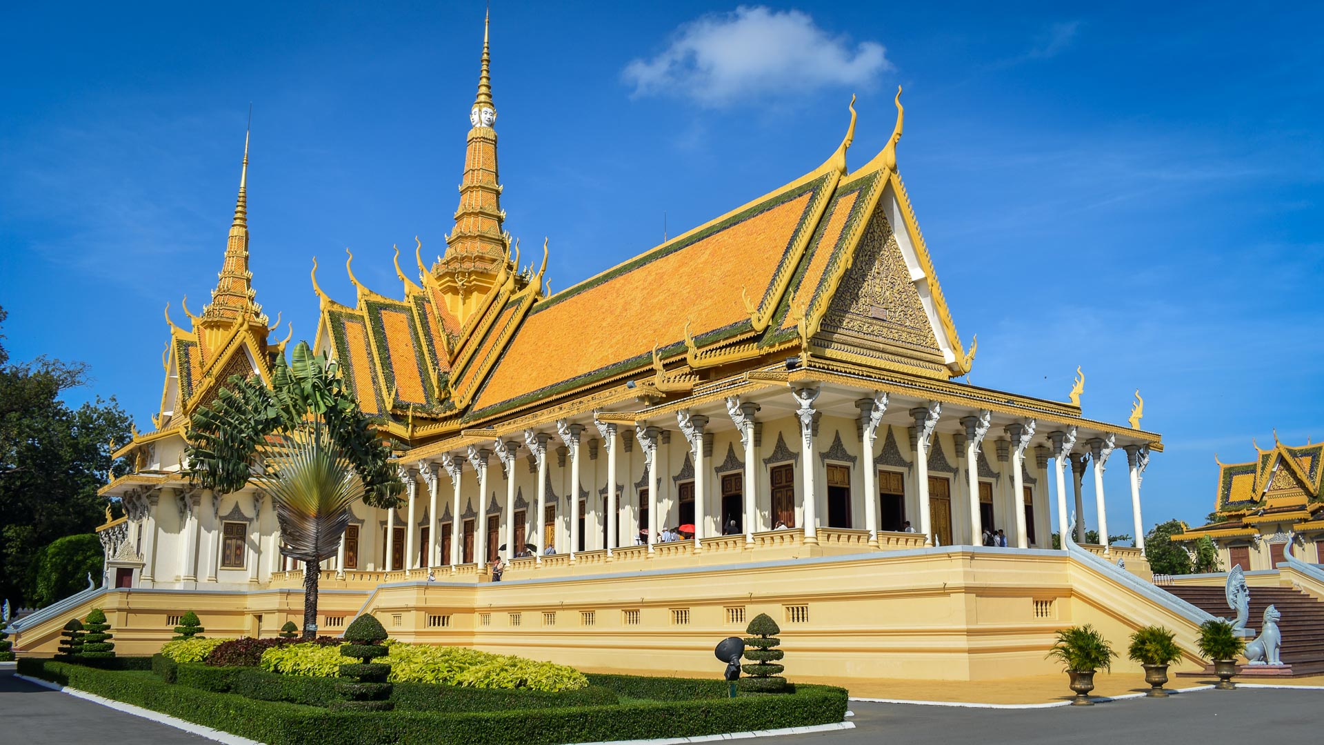 Tourists sight-see inside the Royal Palace in Phnom Penh