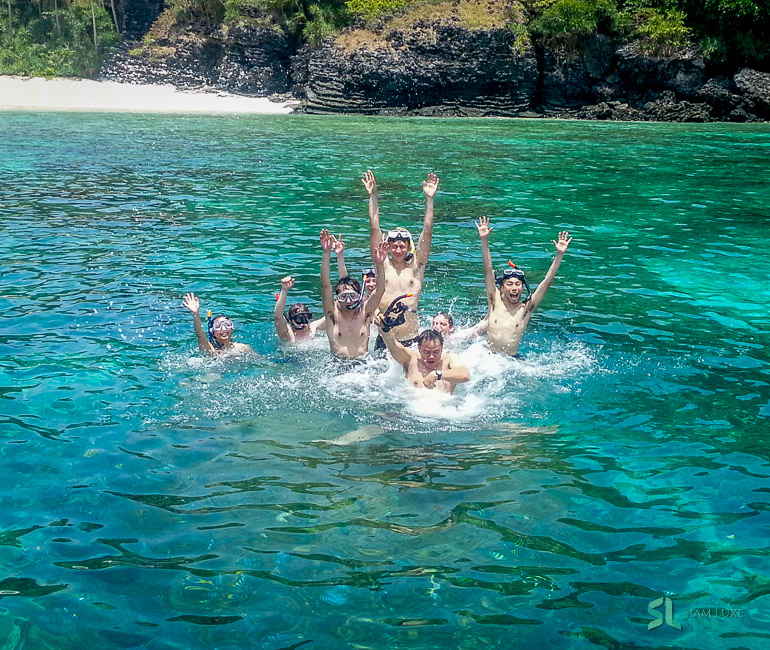 A group of tourists enjoy swimming on the Phi Phi Islands